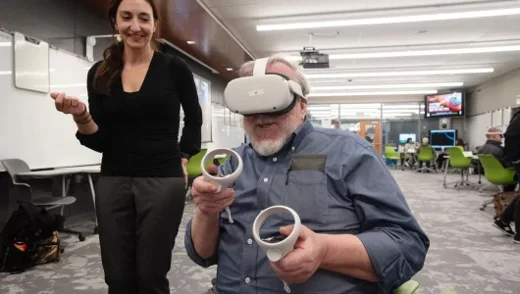 University of Louisville faculty guiding a participant through an iXRLabs VR neurophysiology session