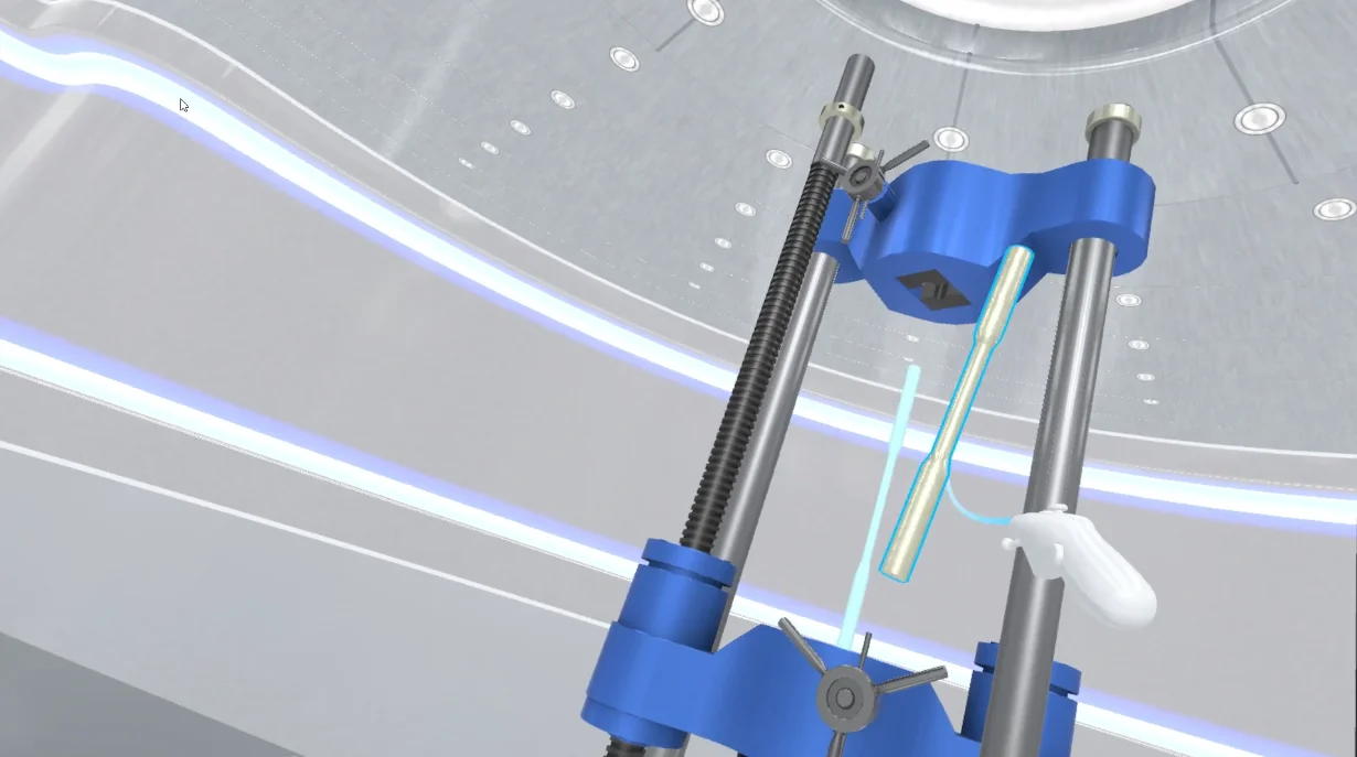 Virtual engineering module showing a universal testing machine with a specimen loaded